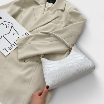 Lora. - Lesklá kožená taška